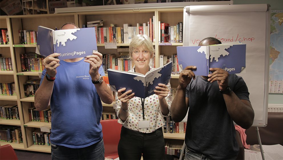 Turning pages volunteer in library