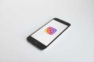 Mobile phone with instagram logo on screen