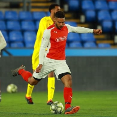 Tyronne playing football in the BT Sport Kit
