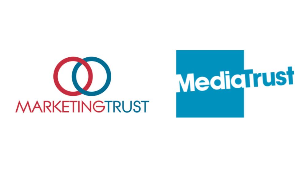 Marketing Trust and Media Trust logos.