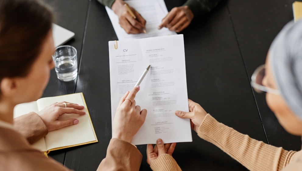 People looking at CV