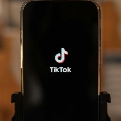 A mobile phone showing the TikTok logo