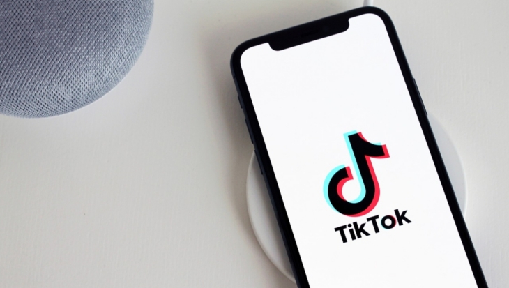 A mobile phone showing the TikTok logo