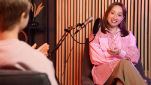 Two people recording a podcast.